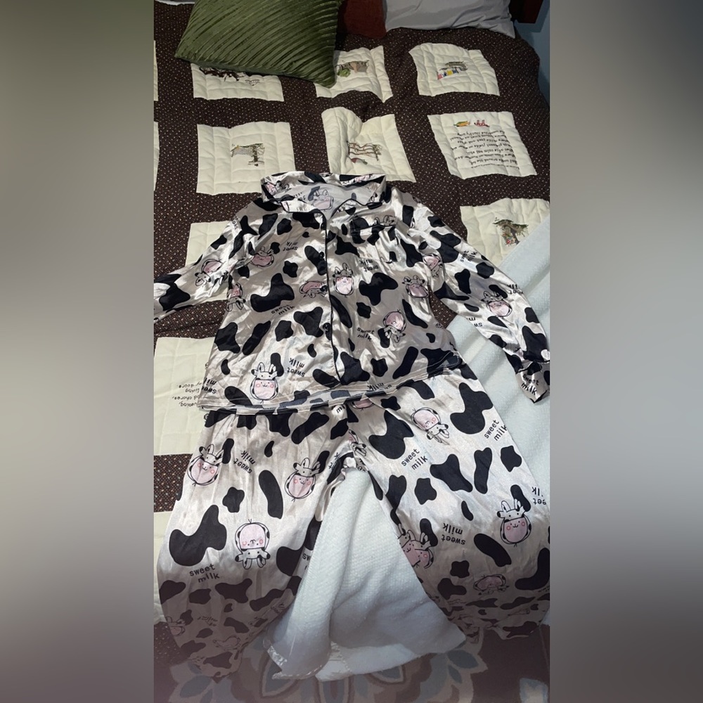 Medium sized silk, cow print pajamas